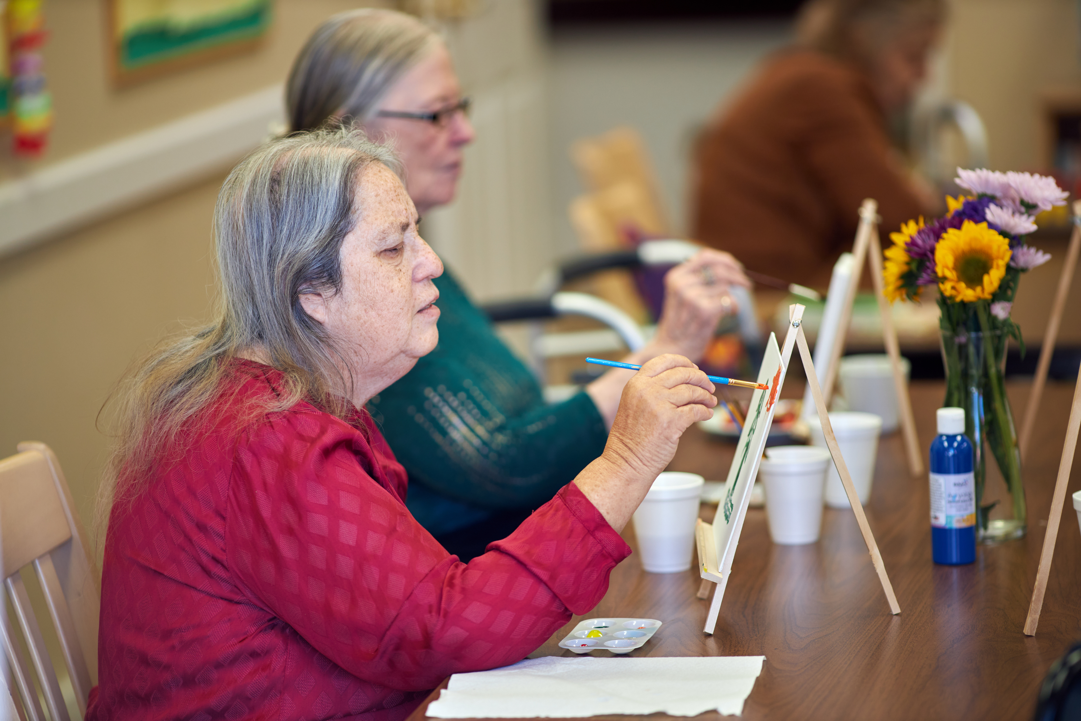 Cappella Pueblo West Senior Living Community in Pueblo West, CO - cpw residents painting large landscape